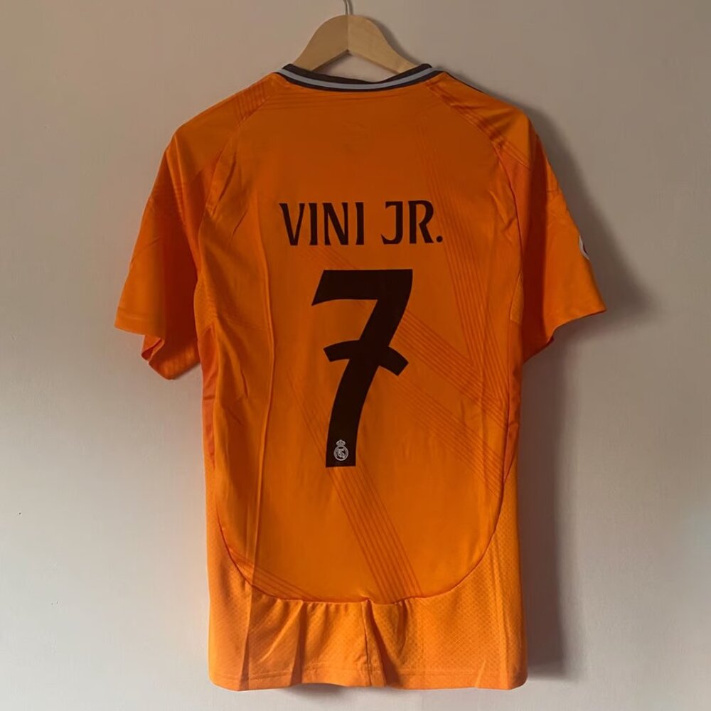 Vini Real Madrid orange jersey
